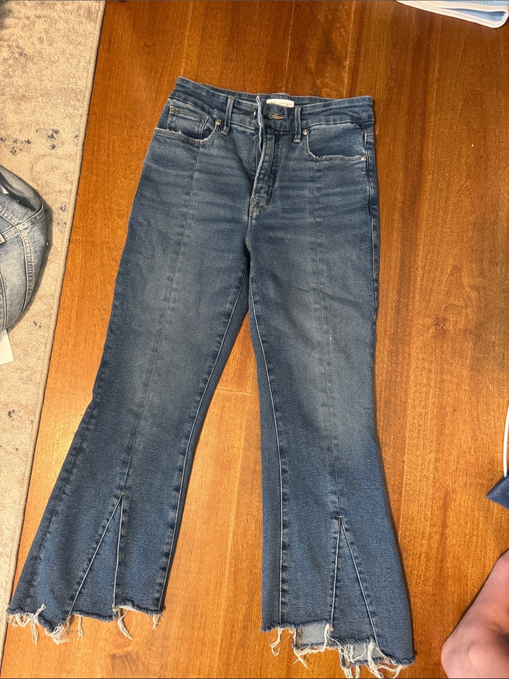Good American Dark Blue Flared Jeans with Frayed Split Hems